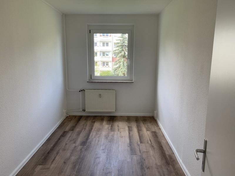 Moderne 5-Raum-Erdgeschosswohnung mit Balkon, Hauswirtschaftsraum & viel Platz in Lusan! - Photo 2
