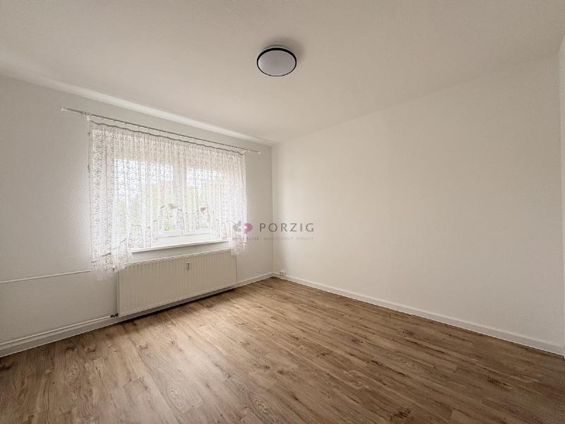 Helle 2-Raum-Wohnung mit offenem Wohn- und Küchenbereich - Foto 5