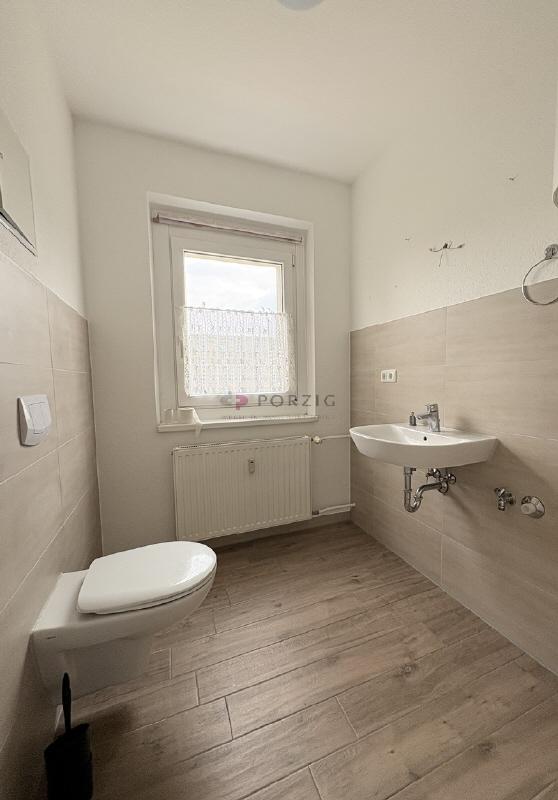 Helle 2-Raum-Wohnung mit offenem Wohn- und Küchenbereich - Foto 3
